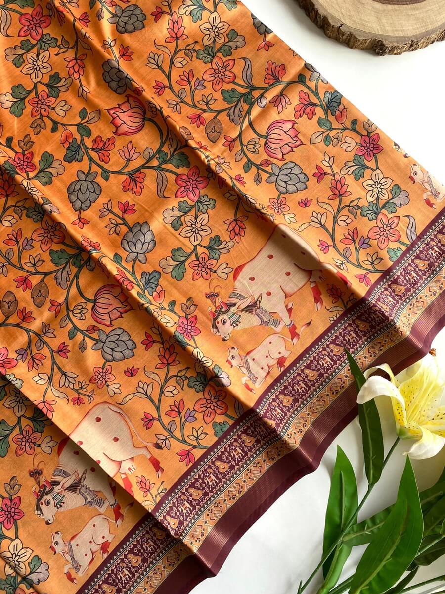 Engaging Orange Kalamkari Printed Viscose Dola Silk Saree With Artistic Blouse Piece